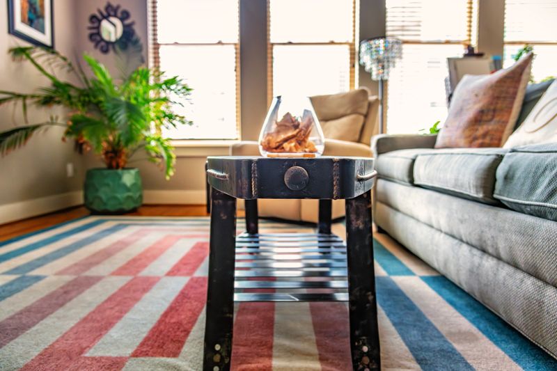 Hand crafted, one of a kind, steel and wood coffee table fashioned using repurposed old leaf springs from an antique 1972 Dodge Charger.