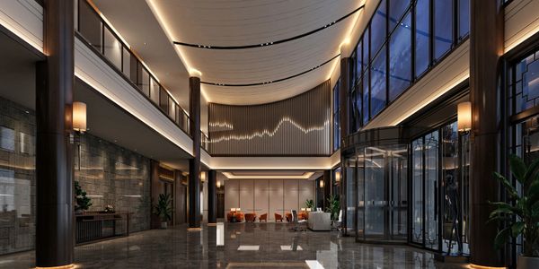 Luxurious hotel lobby with modern design and warm lighting.