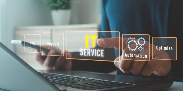 Person interacts with virtual IT service interface.