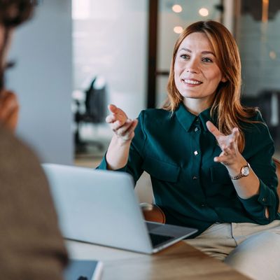 Woman explaining something during a meeting.