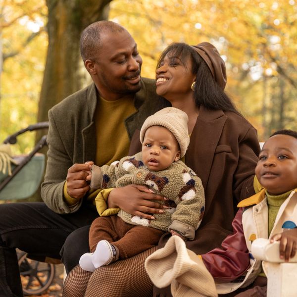 Smiling Black family with baby and son, Collectify Labs Chicago