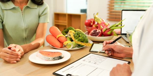 Nutrition consultation focusing on healthy foods and diet planning.