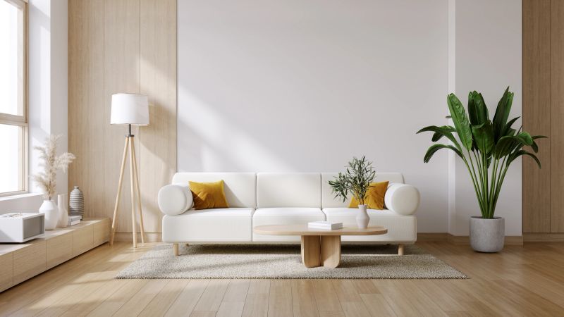 Modern  mid-century interior living room with white sofa and wooden coffee table on white wall .3drender