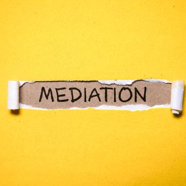 The word MEDIATION revealed under torn paper.