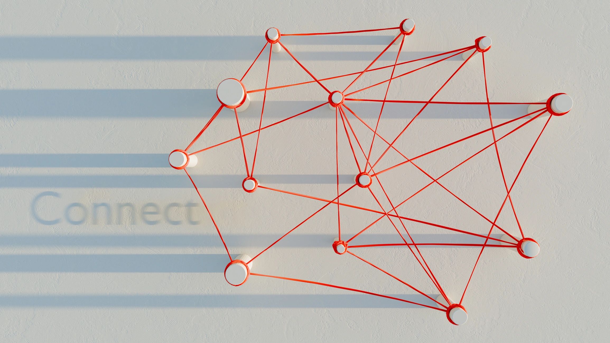 Cylindrical objects connected by red strings