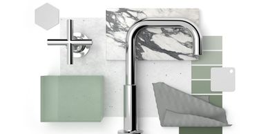 Modern faucet and handle with green and gray design materials arranged neatly.