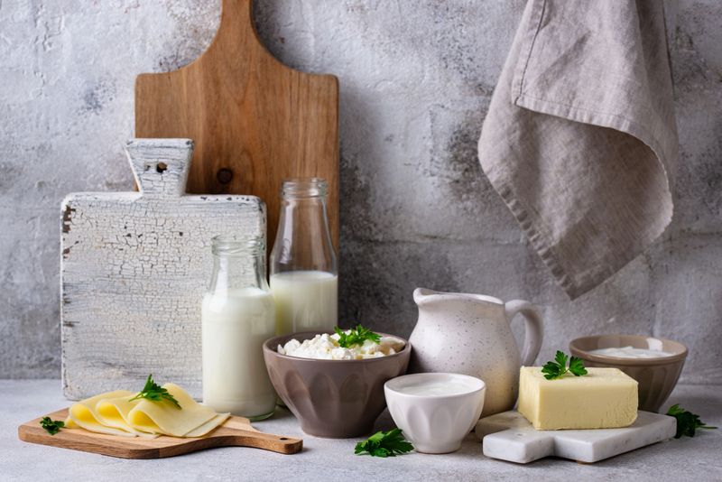 Assortment of dairy products. Milk, cottage cheese, cheese, cream, butter and yogurt