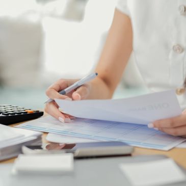 Bunch of papers at a desk 