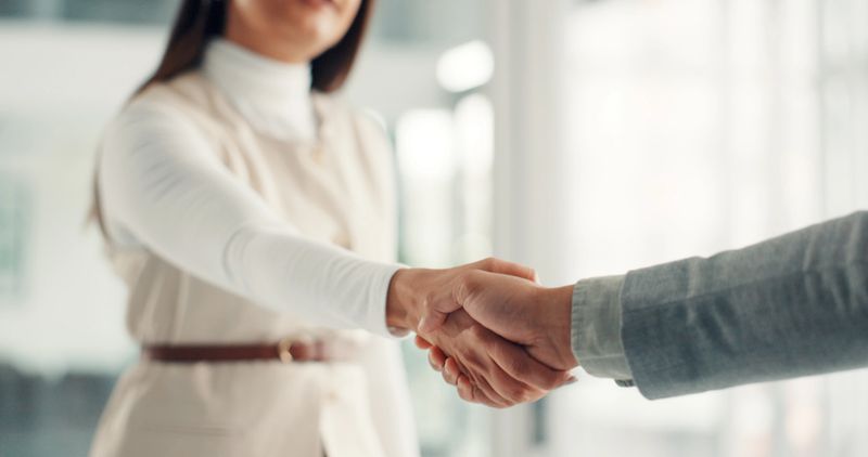 Shaking hands, recruitment or deal with welcome at office, thanks and success with hiring at company. Business people, HR manager and handshake with onboarding, interview or congratulations at agency