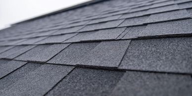 Close-up of a roof with asphalt shingles.