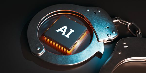 A computer chip labeled AI inside a handcuff, symbolizing AI restrictions.
