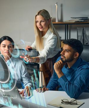Business team engaged in a presentation meeting in a bright office.