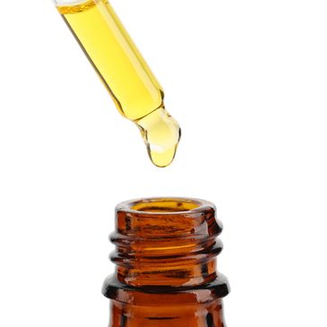 Drips from an amber droplet bottle