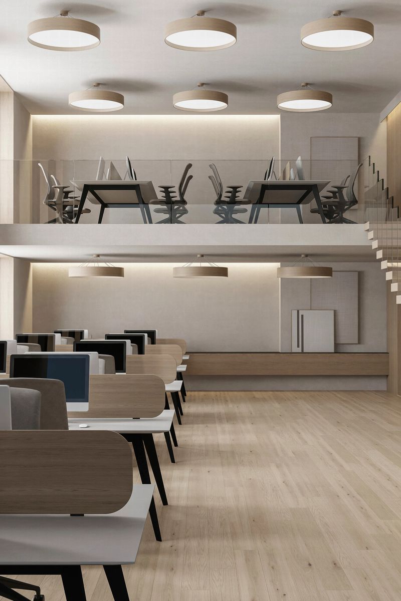 Modern open work space office interior in japandi scandinavian style. Natural elements and materials. Large windows and wooden stairs with glass fence. Led light ceiling. Modern design. Two story levels. Floor tile long parquet pine matte. Laminate Wood floor. Natural condition. Light wood texture. Empty space. Copy space. Natural light. Working space.