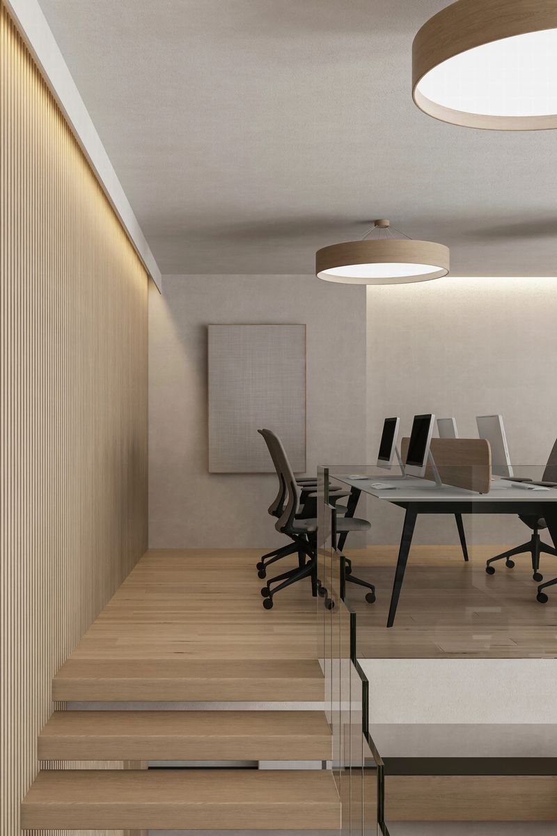 Modern open work space office interior in japandi scandinavian style. Natural elements and materials. Large windows and wooden stairs with glass fence. Led light ceiling. Modern design. Two story levels. Floor tile long parquet pine matte. Laminate Wood floor. Natural condition. Light wood texture. Empty space. Copy space. Natural light. Working space.