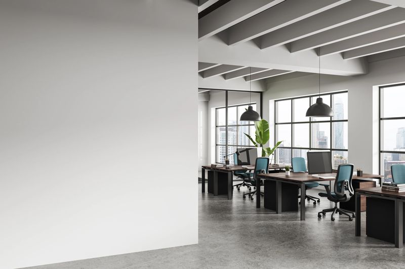 Contemporary office interior with clean empty wall for poster mockup, realistic style, modern workspace background, concept of creative presentation layout. 3D Rendering