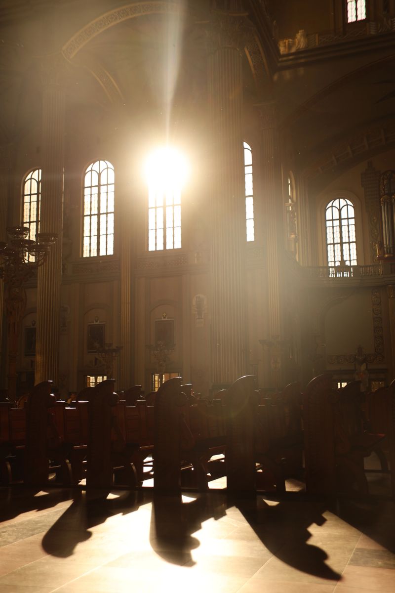 The light of the sun falling through the windows of the church