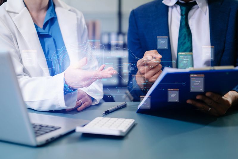 Business professionals using smartphone and holographic AI data interface to analyze digital information and innovate in a modern corporate office.