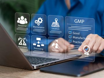 Person interacting with virtual GMP quality control interface.