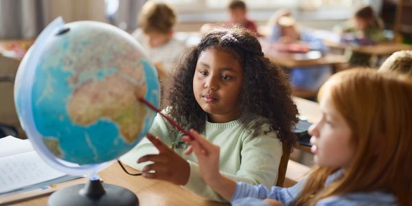 Students working together in a classroom.