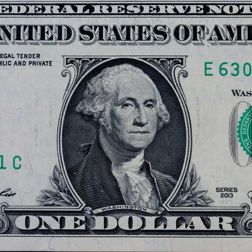 a close up of a dollar bill.