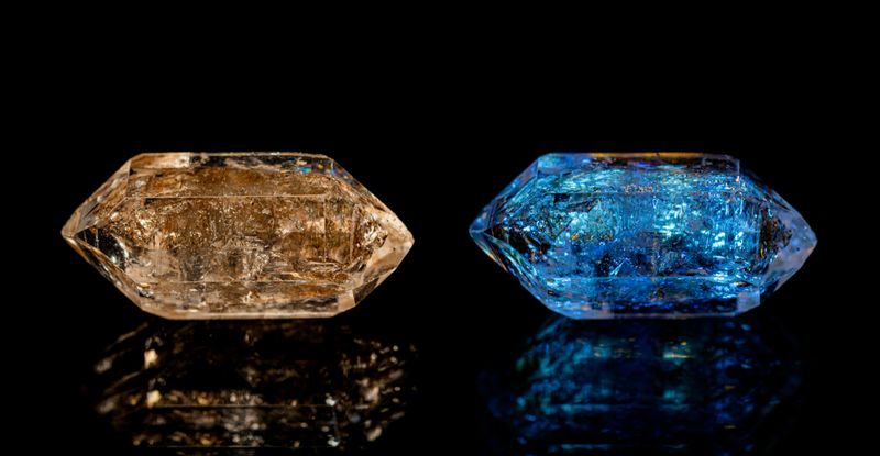 Closeup petroleum quartz (Enhydro/EnPetro Quartz)(quartz with hydrocarbon inclusions) under visible and UV light  in the same position