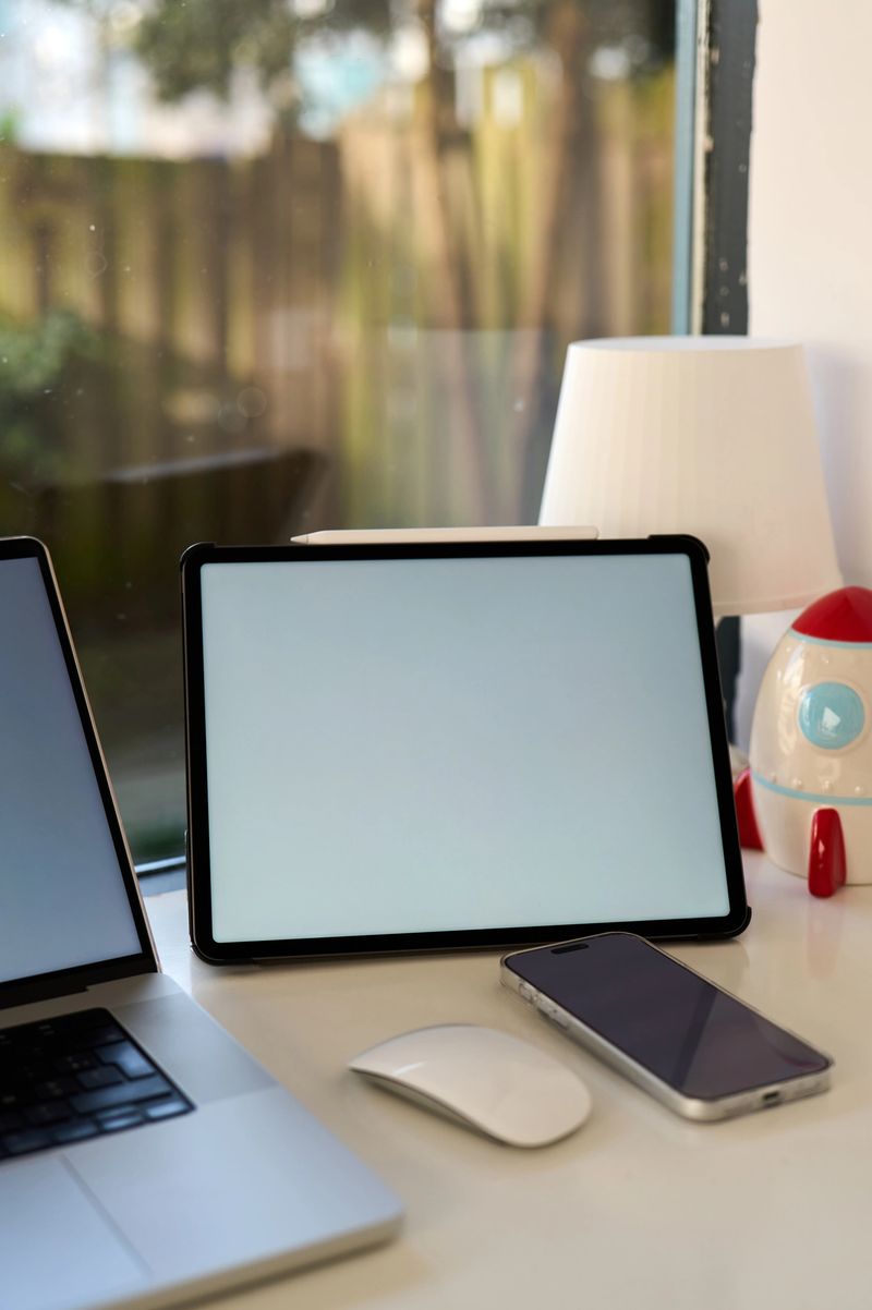 Modern home office workspace featuring an array of essential digital technology devices