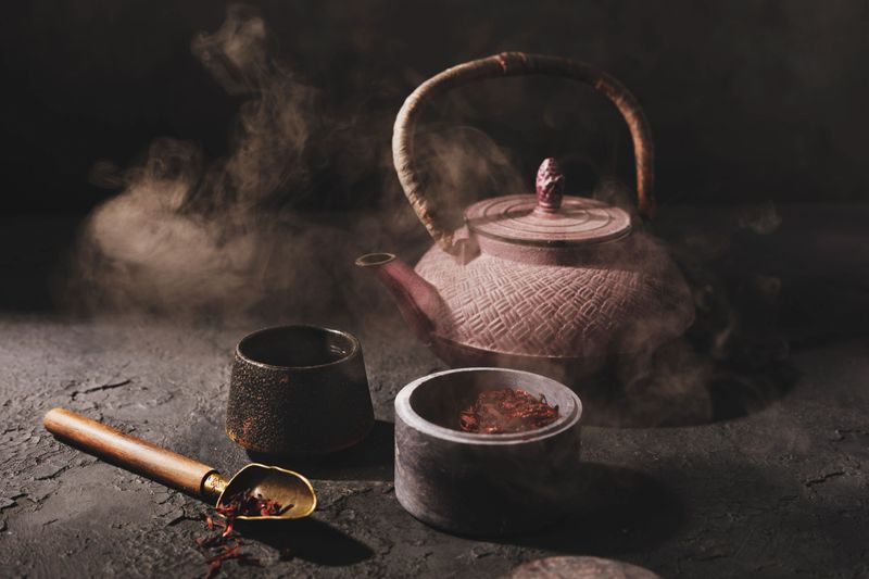 Traditional chinese tea ceremony in a smoky kitchen