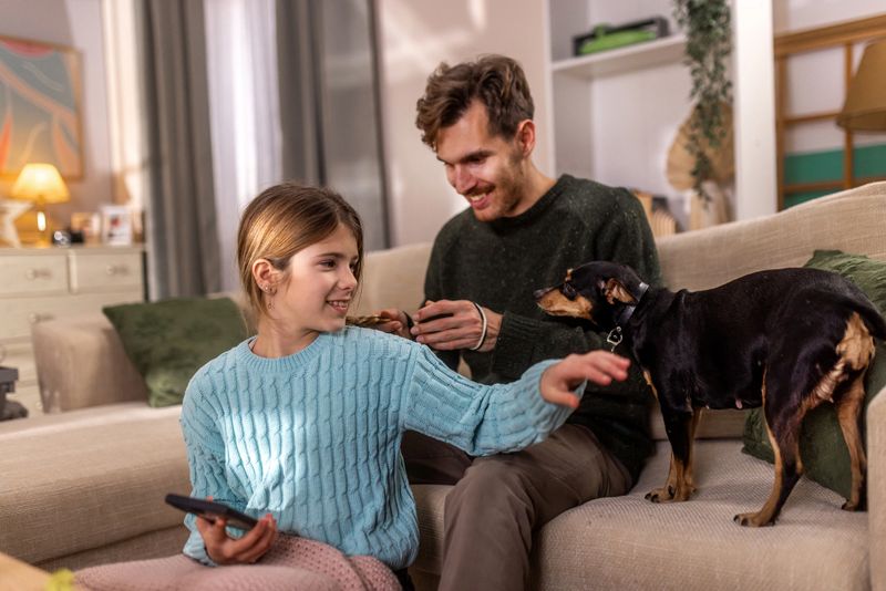 Family bonding moments as parents take selfie with their daughter