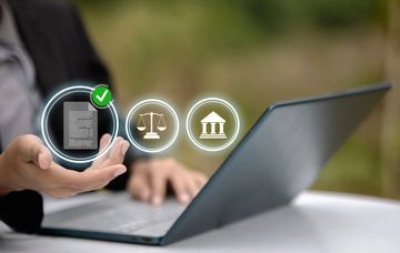 Digital signature on a tablet beside a contract document and keys.