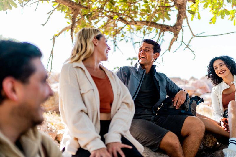 Friends talking during hike