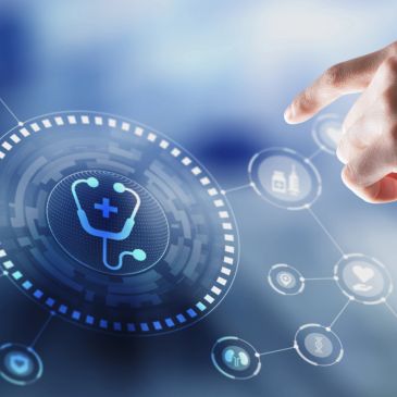 Hand interacting with digital healthcare interface.