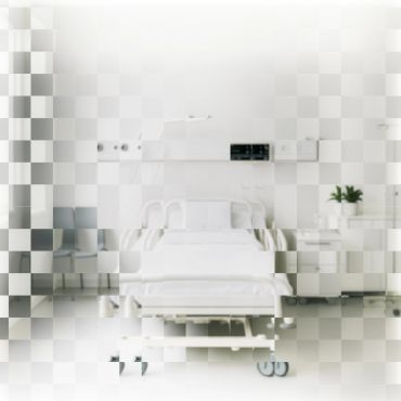Bright hospital room with a single bed and medical equipment.