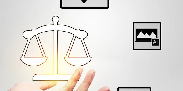 Hand holding a glowing justice scale icon with AI and legal symbols around.