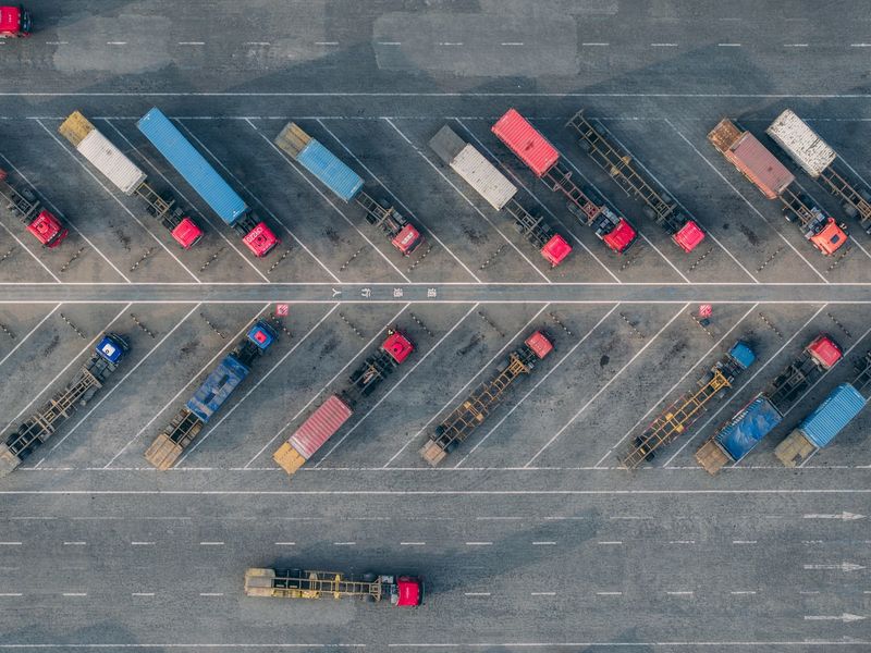 Aerial View of Trucks Entering Container Terminal