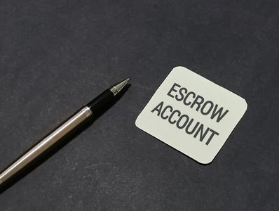 Escrow account card and pen.