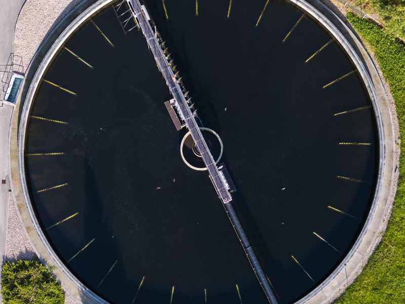 Advanced wastewater treatment technology operates efficiently in an urban setting highlighting the importance of sustainable water management in future cities.