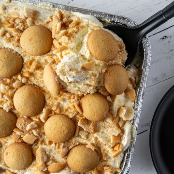 Banana pudding with vanilla wafers in a pan.