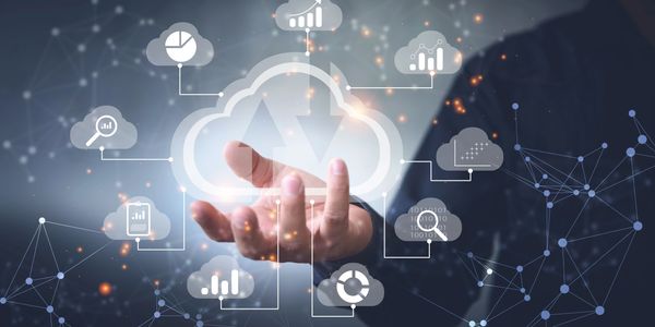 Hand presenting cloud computing and data analytics icons.