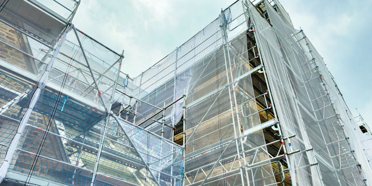 Scaffolding around a building under construction or renovation.