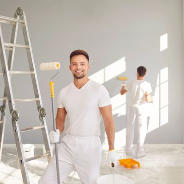 Two men painting a room white.