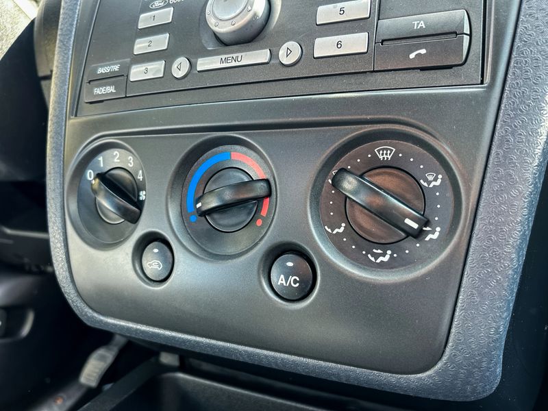 This image showcases a detailed car HVAC control panel, emphasizing key climate control features that optimize comfort and improve the vehicles overall functionality