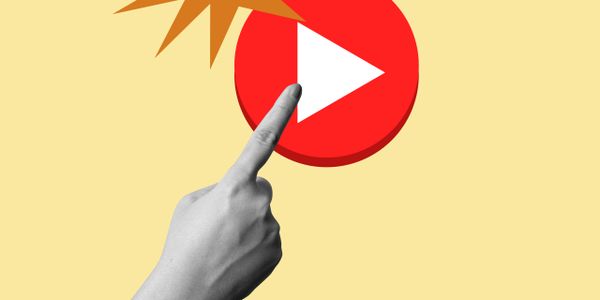 Hand pointing to a large red play button symbol.