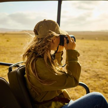 Person taking photos on a safari.