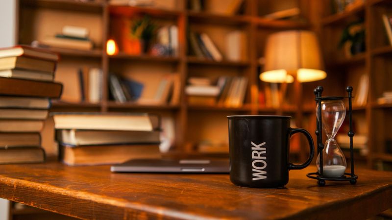 This image captures the essence of focused work and study in a warm, inviting atmosphere, perfect for remote professionals or students