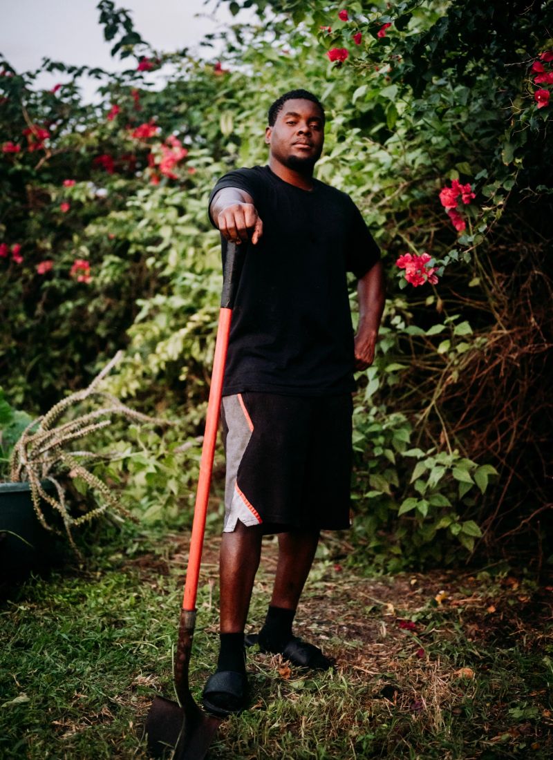 Mans hand with a garden tool