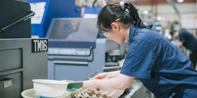 Woman working in a manufacturing facility.