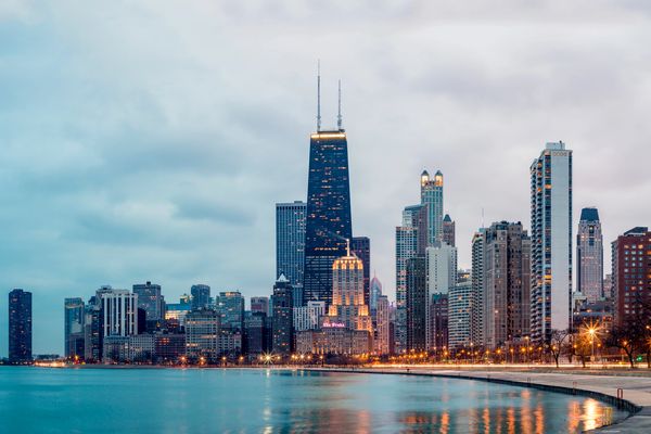 Chicago skyline at dusk by the lake.