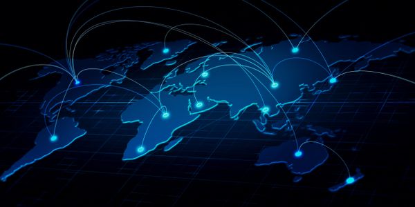 Digital world map showing global network connectivity with glowing connection points.