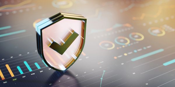 3D shield with checkmark symbolizing security over financial data charts.
